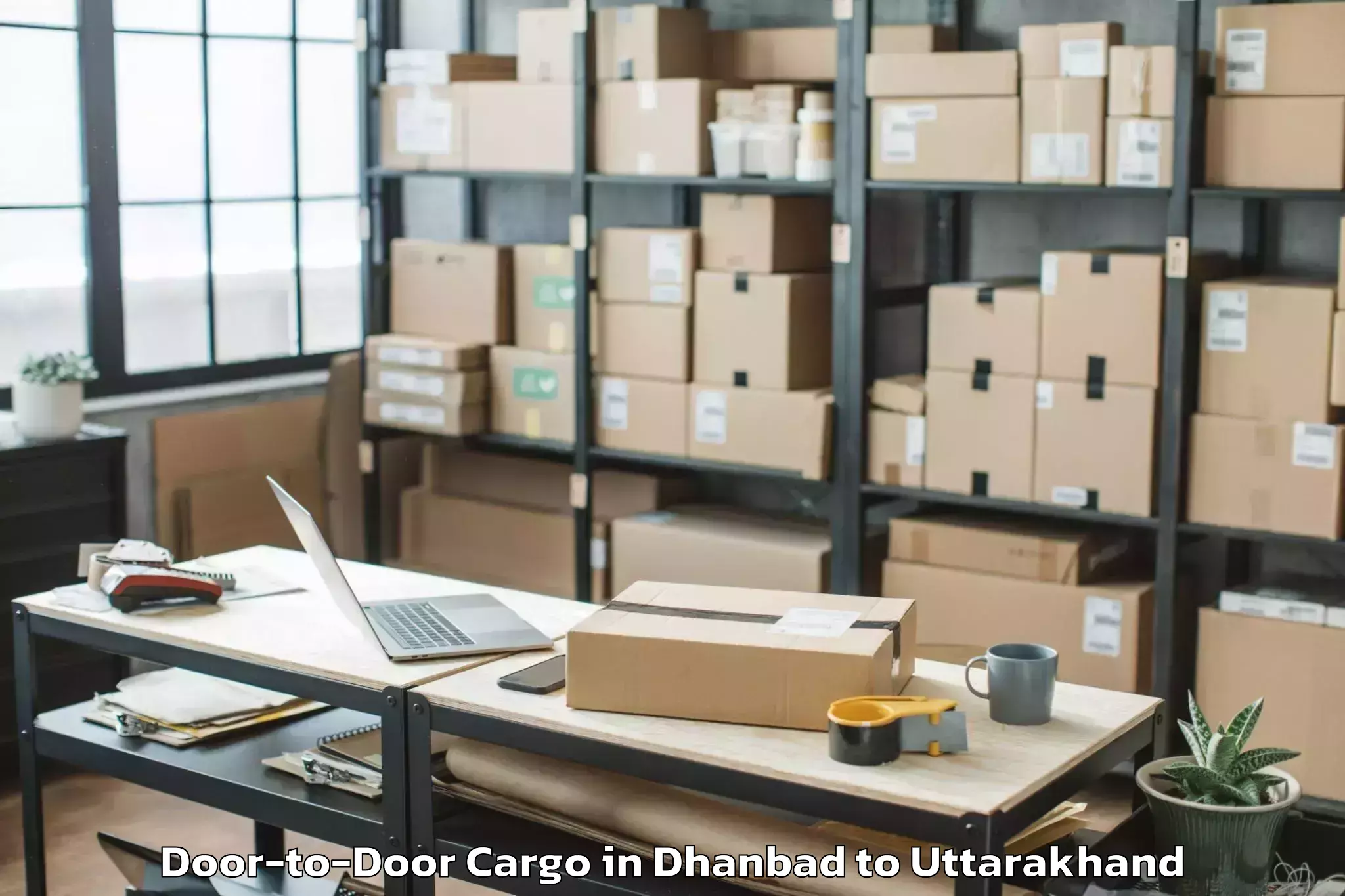 Easy Dhanbad to Bageshwar Door To Door Cargo Booking